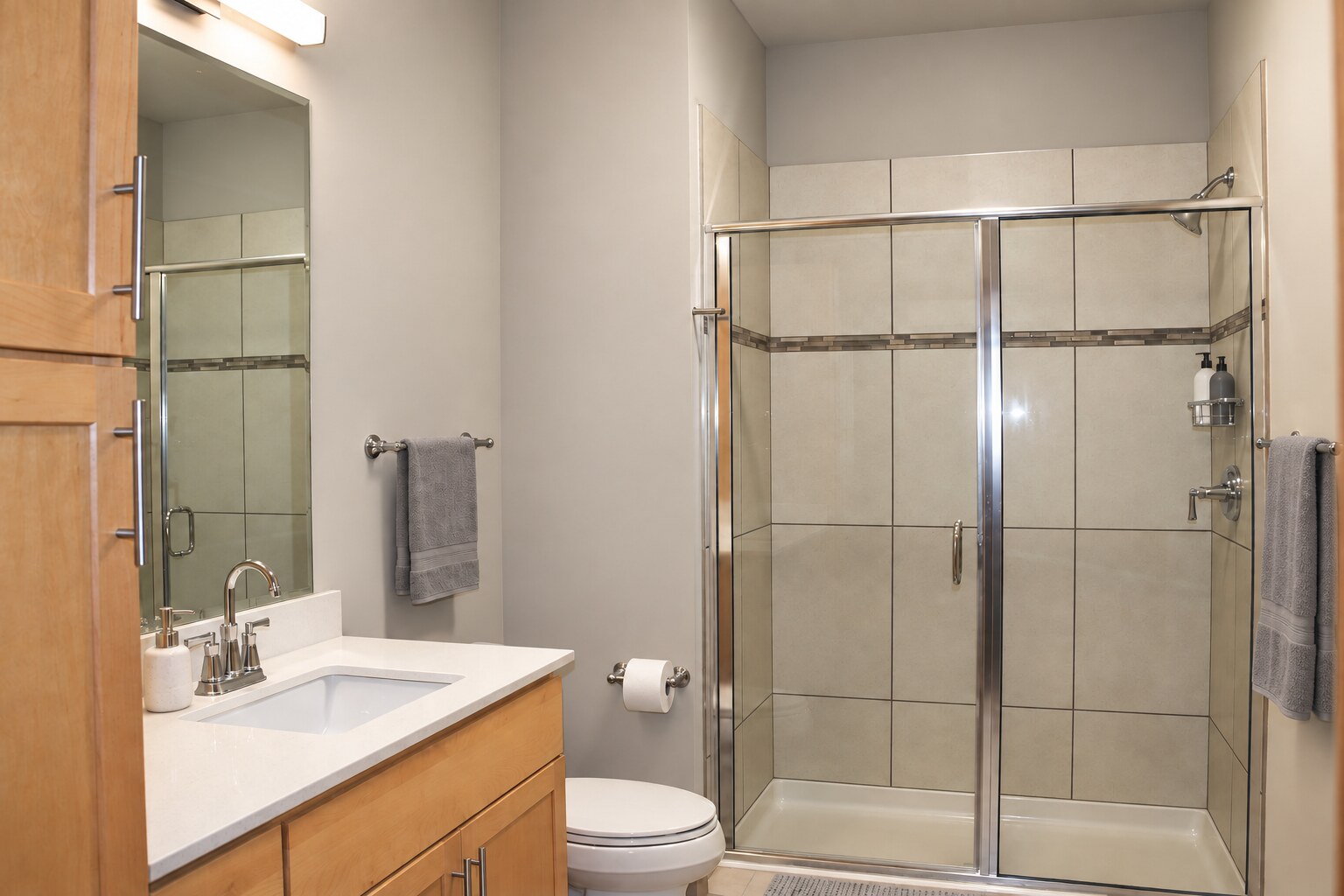 Middleton Station apartment bathroom with tiled shower
