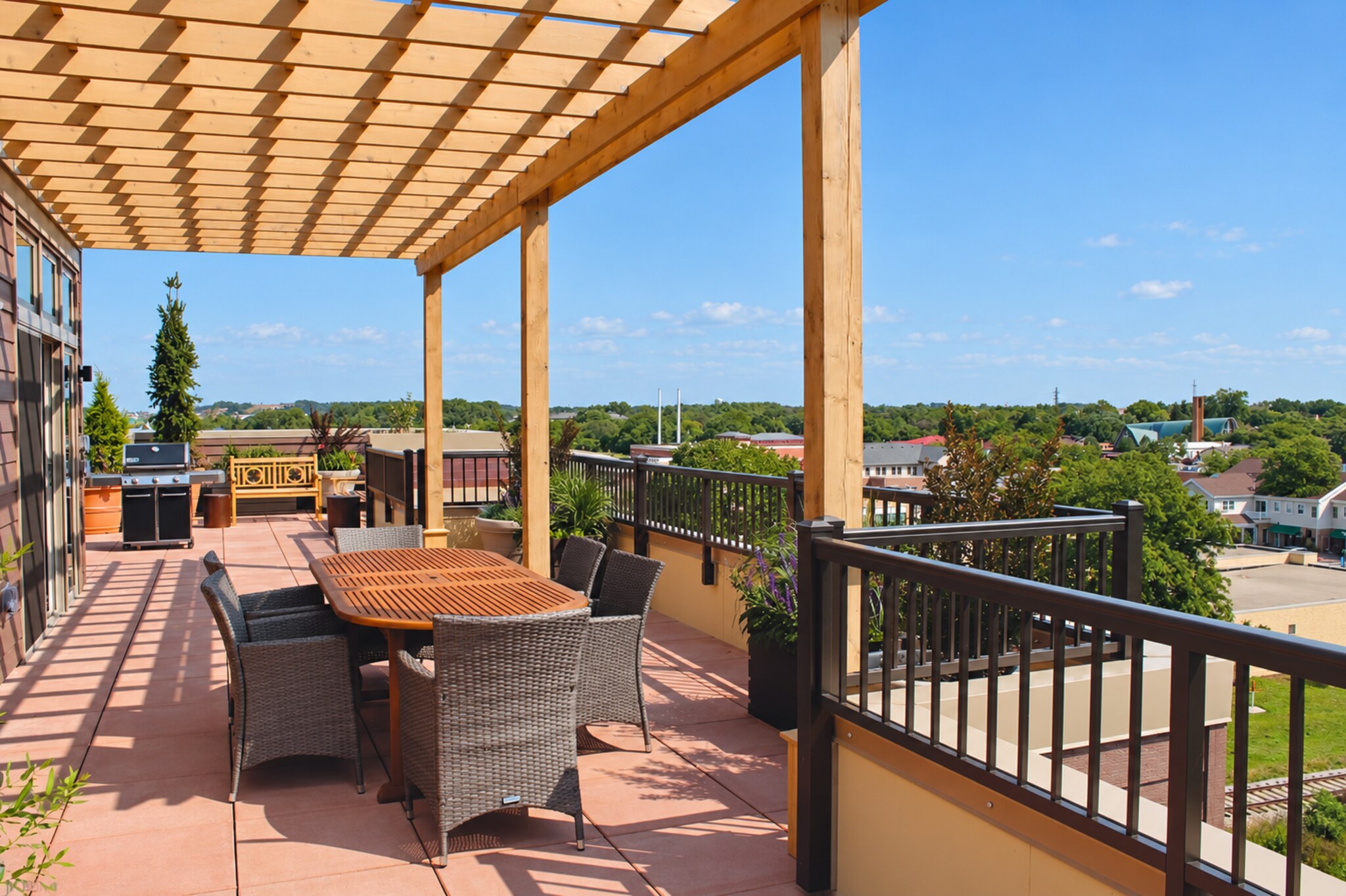 Middleton Station rooftop patio with outdoor dining and grill